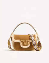 Valentino Garavani Alltime Suede Shoulder Bag With Sheepskin Lining And Embroidered Ribbon Shoulder Strap