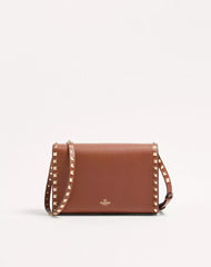 Small Rockstud Grainy Calfskin Crossbody Bag