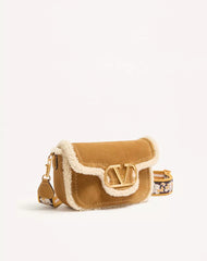 Valentino Garavani Alltime Suede Shoulder Bag With Sheepskin Lining And Embroidered Ribbon Shoulder Strap