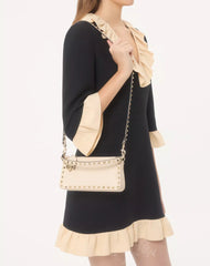 Small Rockstud Grainy Calfskin Crossbody Bag