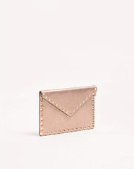 Rockstud Laminated Grainy Calfskin Clutch Bag