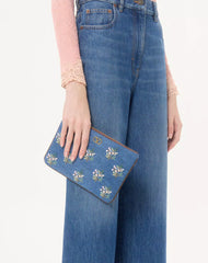 Valentino Garavani VLogo Signature Clutch Bag In Denim With Floral Embroidery