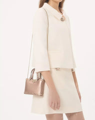 Mini Rockstud Shopping Bag In Laminated Grainy Calfskin.