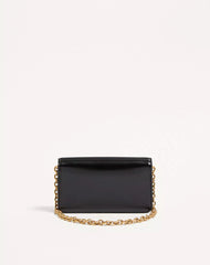 Valentino Garavani Vain Clutch Bag In Shiny Calfskin